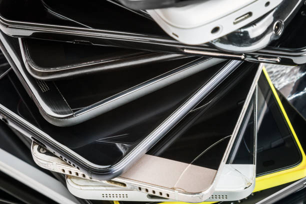 Stack of used business mobile phones ready for secure recycling and disposal.