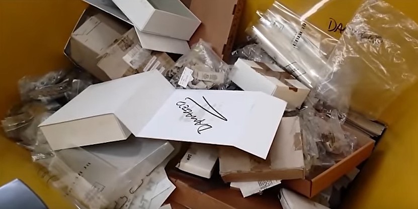 Packaging materials being shredded by our machine as part of a UK business packaging destruction service