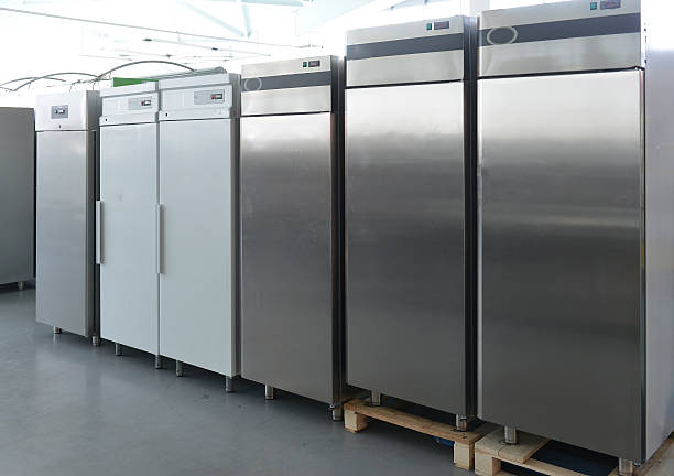 Large commercial freezers ready for eco-friendly recycling and responsible disposal.