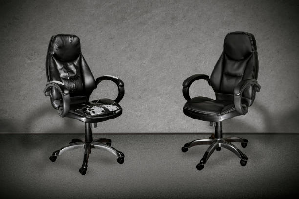 Two office chairs prepared for collection and furniture recycling by Pops Furniture in the UK