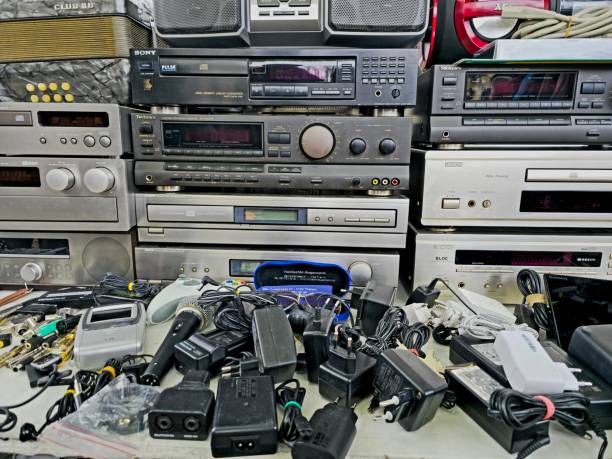 Vintage HiFi audio components stacked for disposal or recycling.