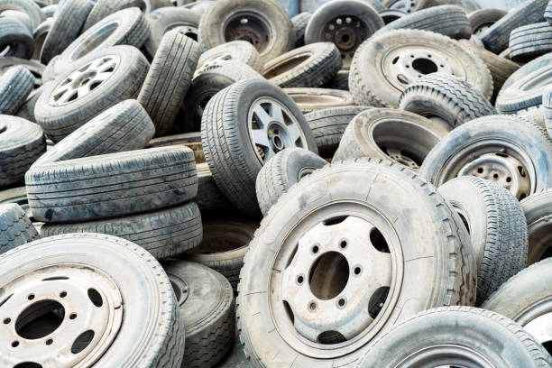 Used tyres with rims prepared for recycling by our UK tyre disposal service