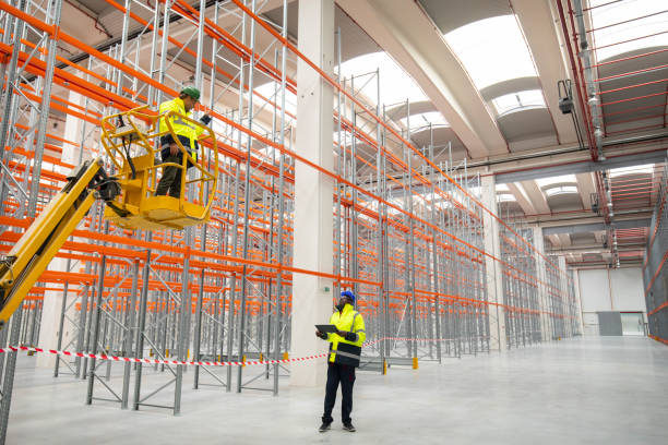 Warehouse racking being dismantled and cleared by our UK clearance team